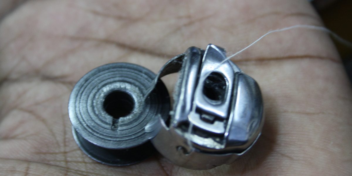 How to Sew On a Button That Stays Put